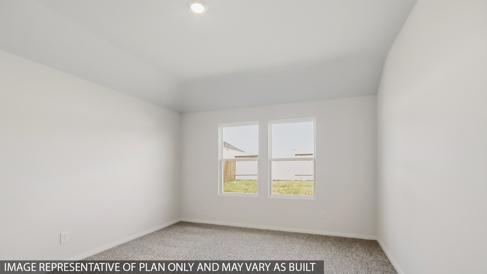 Large Primary bedroom with shag carpet flooring and bright window