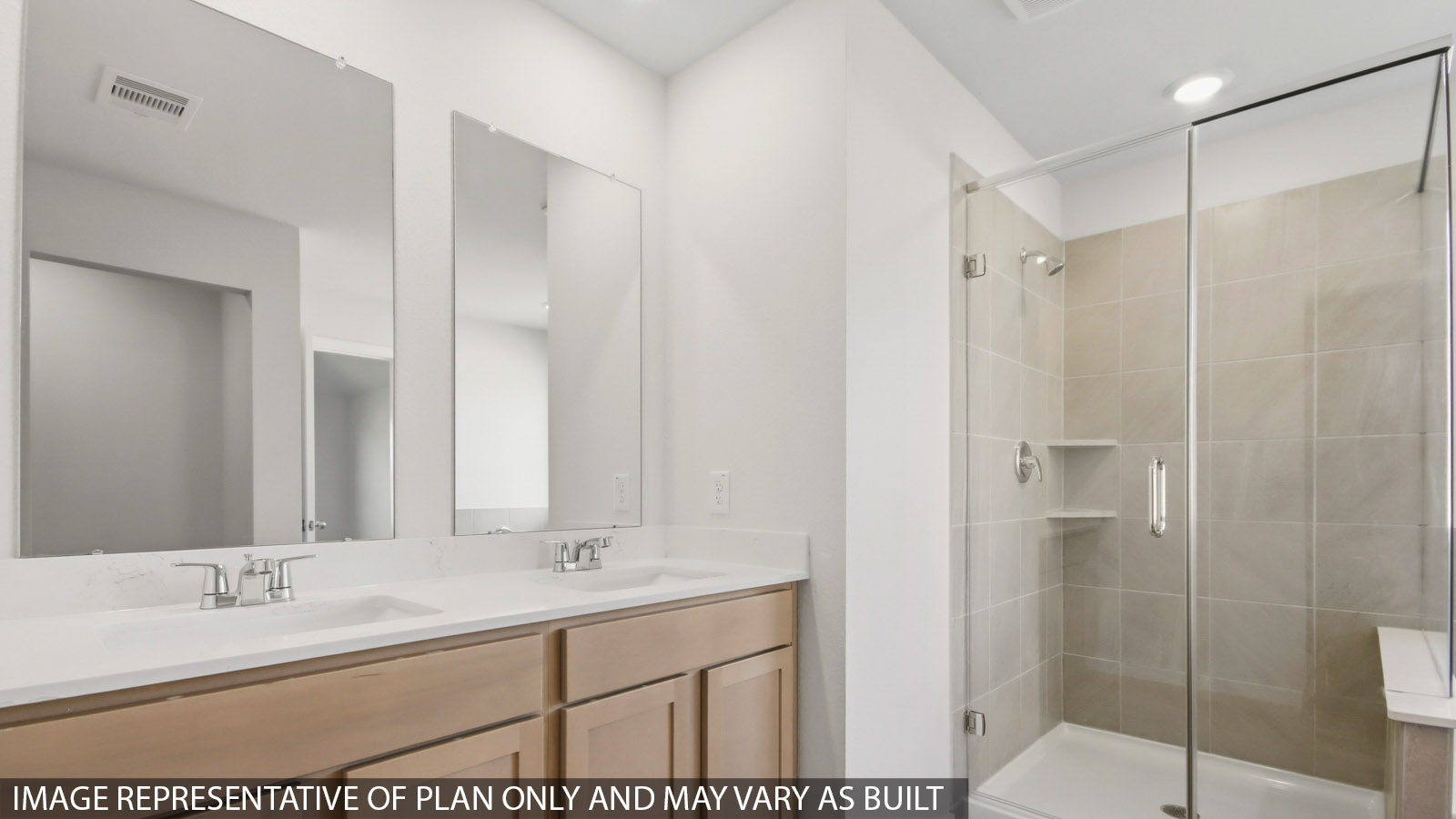 Primary bathroom with stand-alone shower with tiles and semi frameless glass in Magnolia TX
