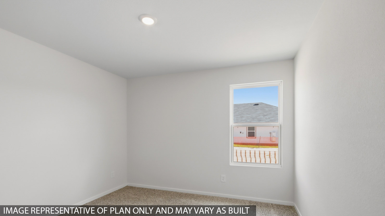 Secondary bedroom with shag carpet flooring and bright window