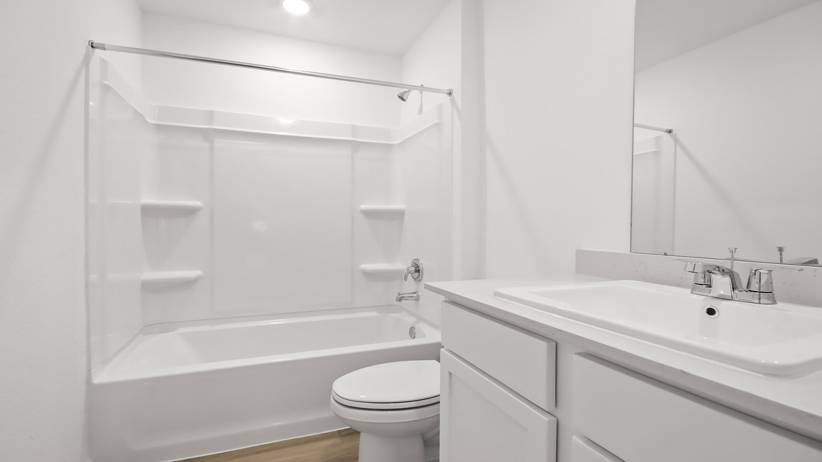 Secondary bathroom with tub/shower combo with quartz counter tops in Magnolia TX