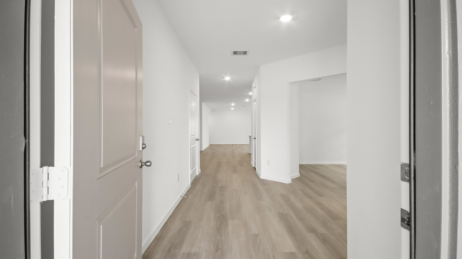 Entry hallway with vinyl flooring sherman williams painted walls