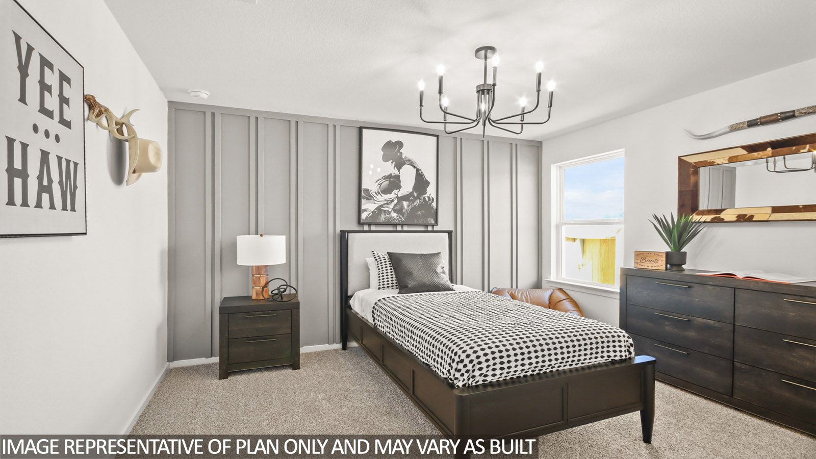Secondary bedroom with shag carpet flooring and bright window