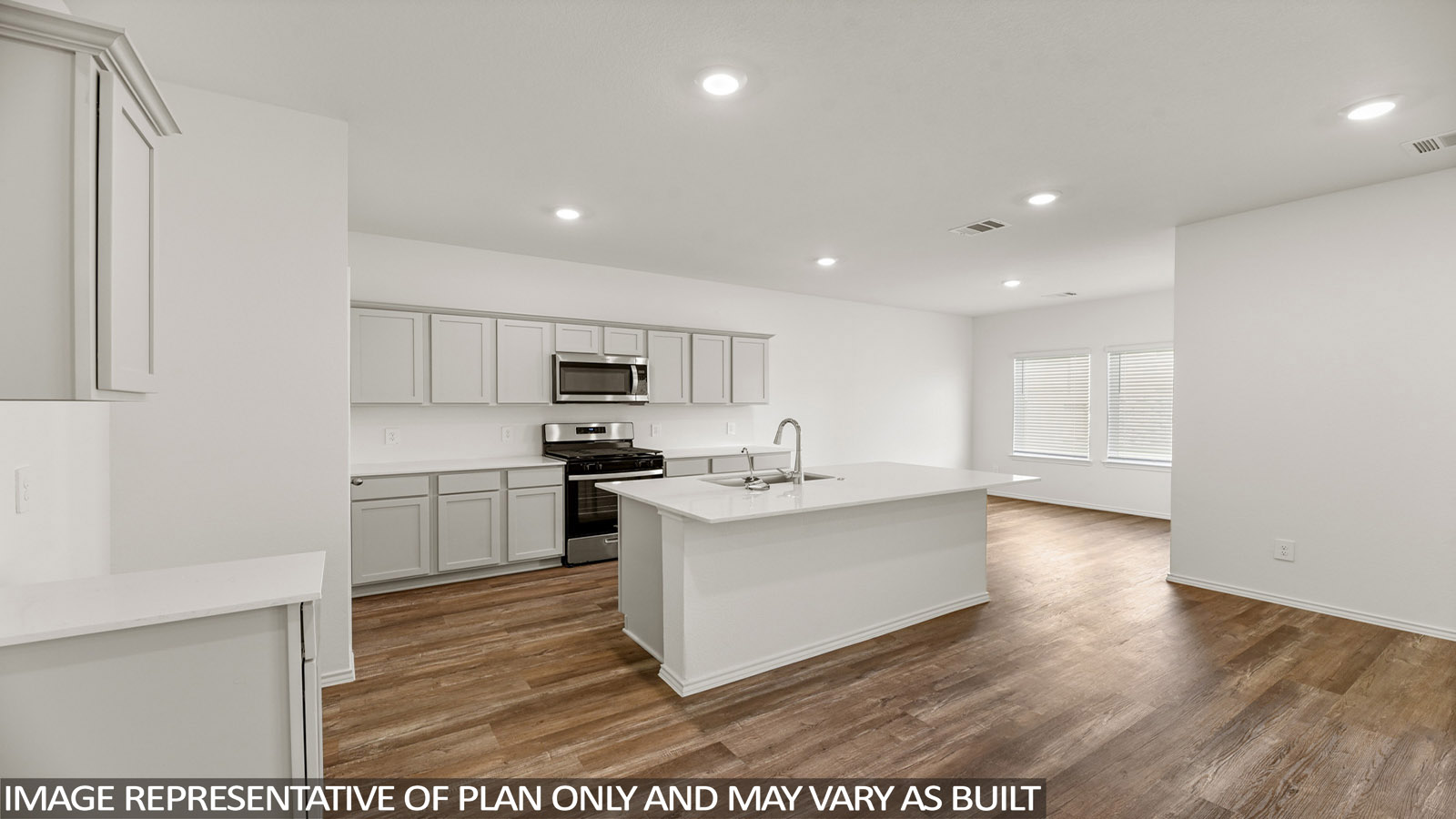 Open concept living, dining, and kitchen area