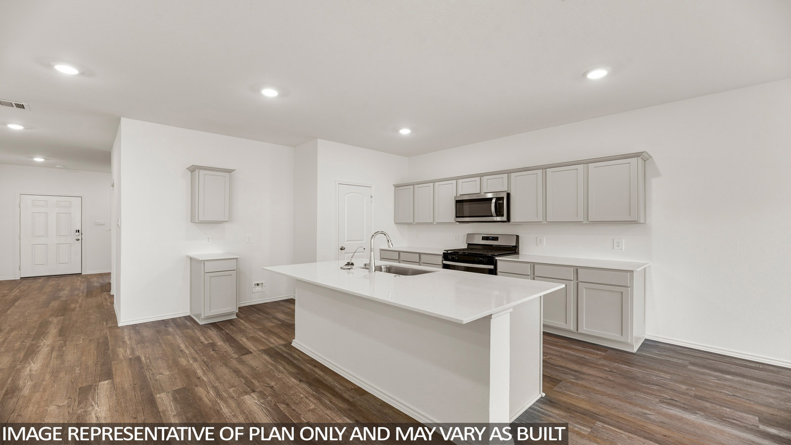 Open concept living, dining, and kitchen area