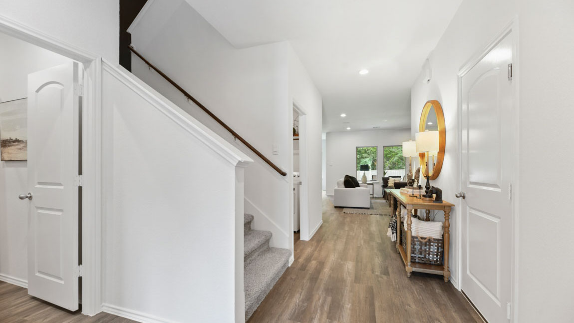 Entry hallway with vinyl flooring