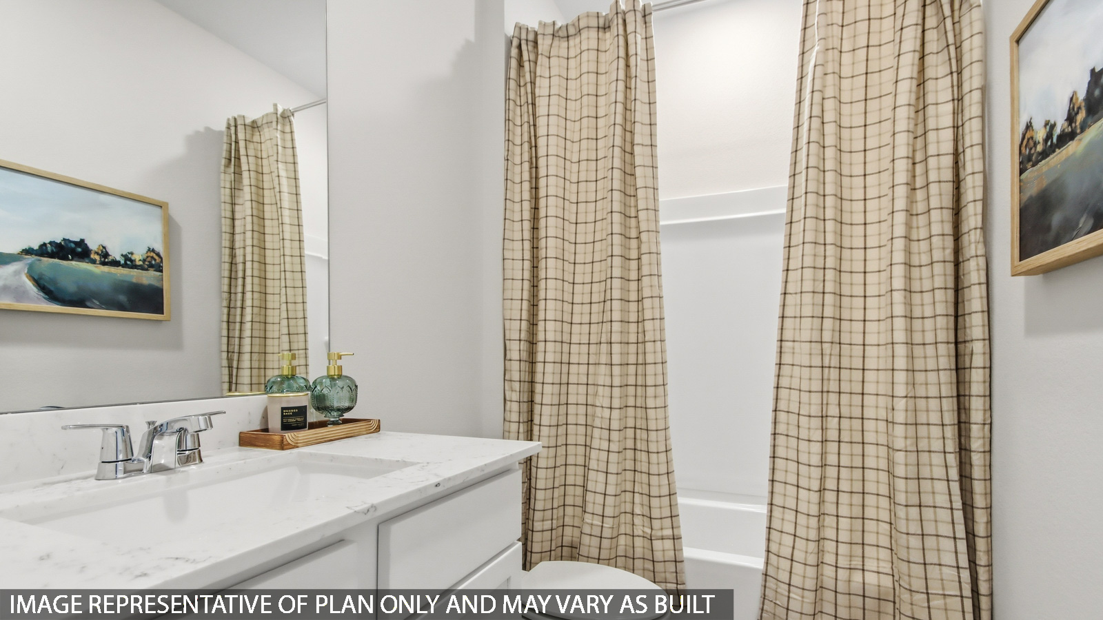 Secondary bathroom with tub/shower combo with quartz counter tops in Magnolia TX