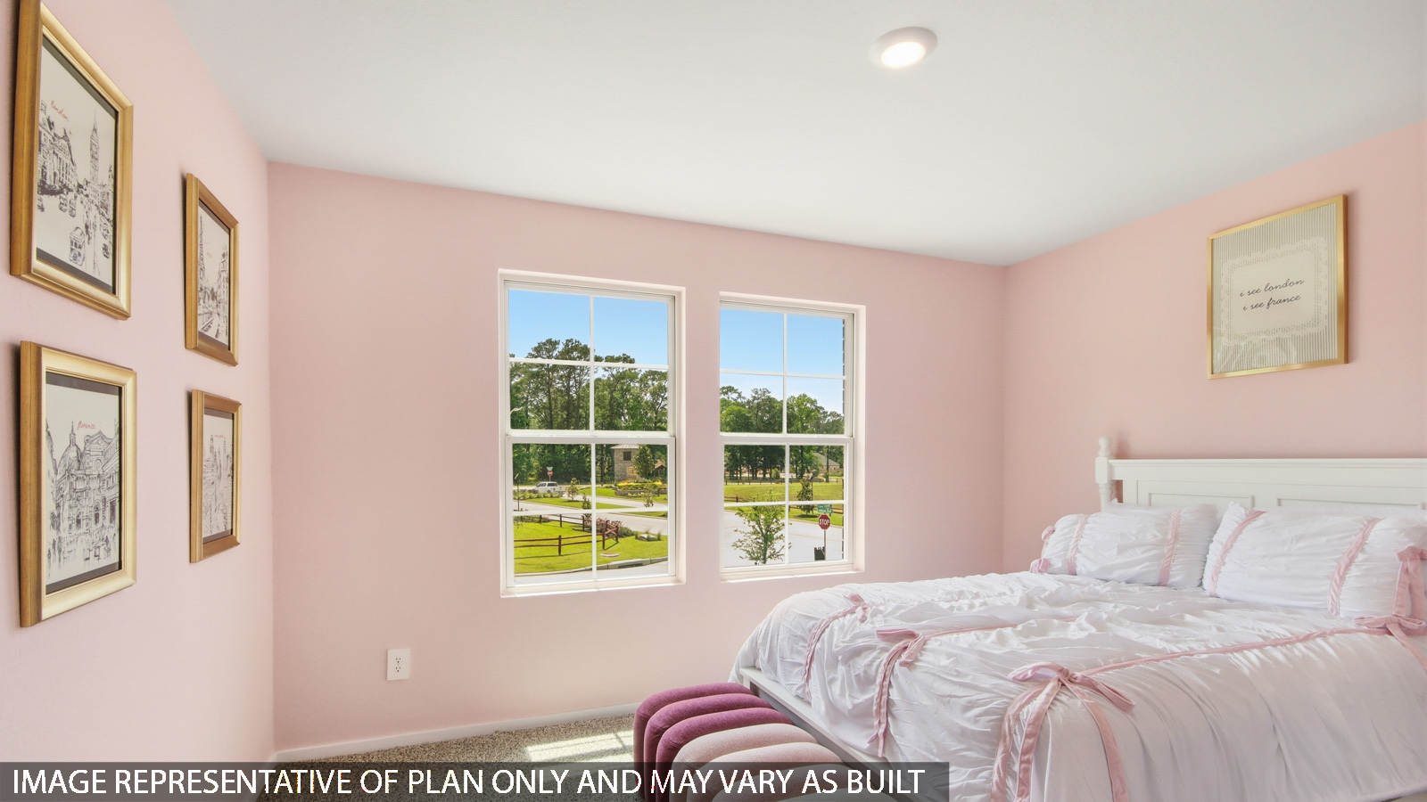 Second level secondary bedroom with carpet flooring and bright window