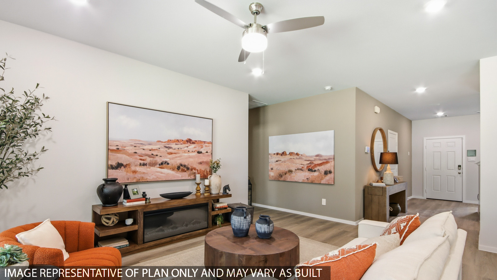 Spacious living area with vinyl flooring and bright windows in Magnolia TX