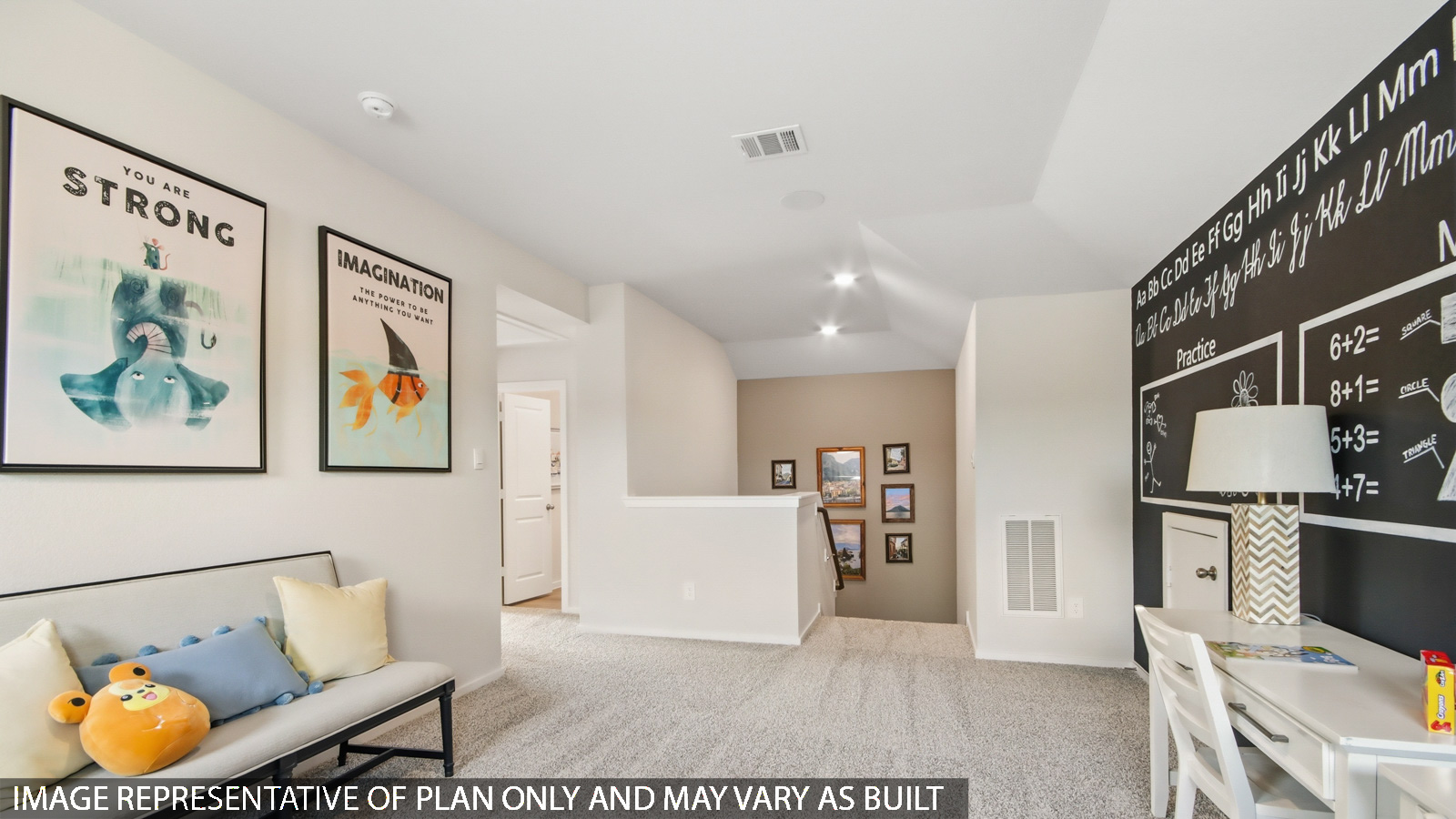 Second story game room with carpet flooring with bright windows in this multi functional space in Magnolia TX