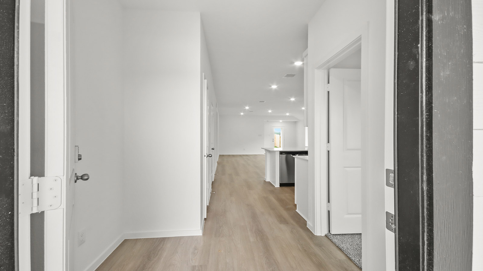 Entry hallway with vinyl flooring sherman williams painted walls