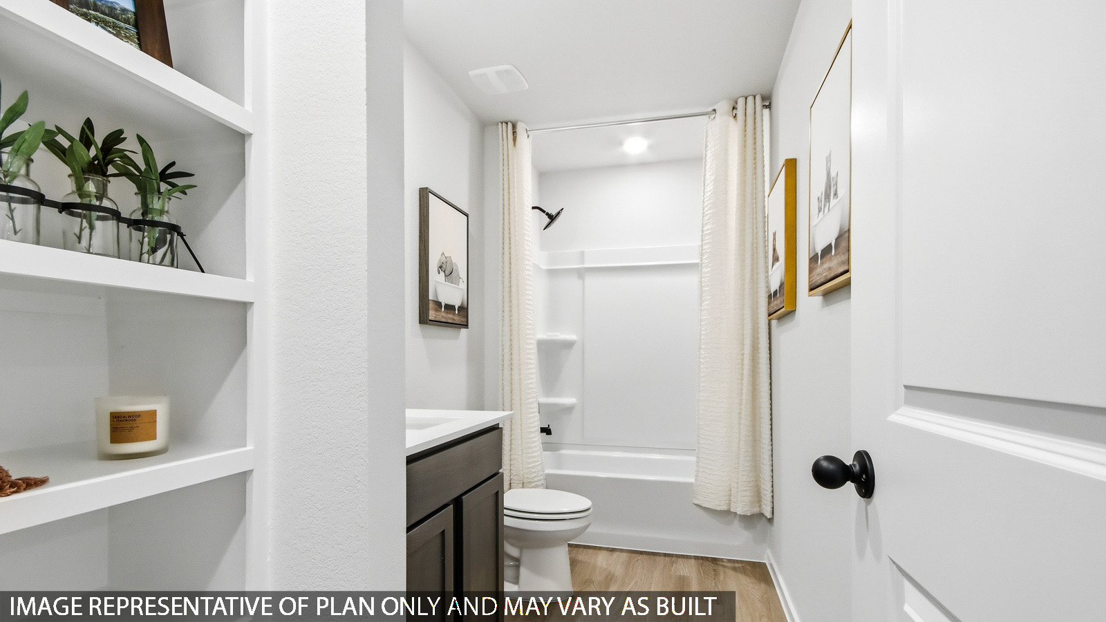 Secondary bathroom with tub/shower combo with quartz counter tops in Magnolia TX
