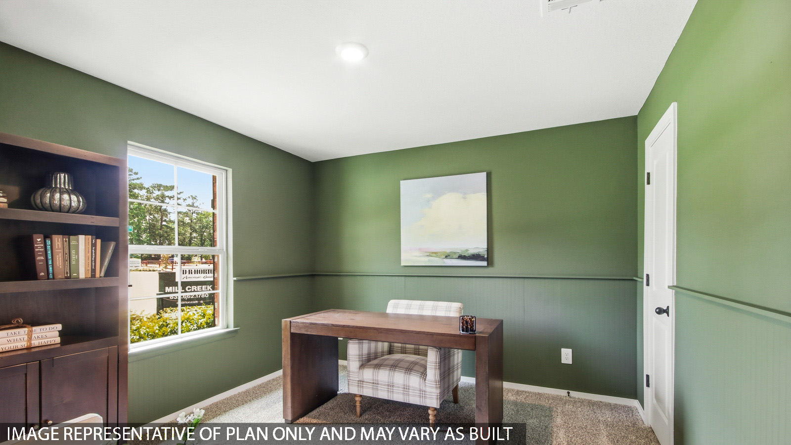 Study with shag carpet flooring and large window