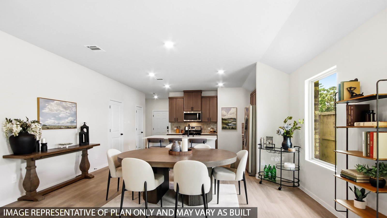 Dining area with vinyl flooring located off from the living room area in Magnolia TX