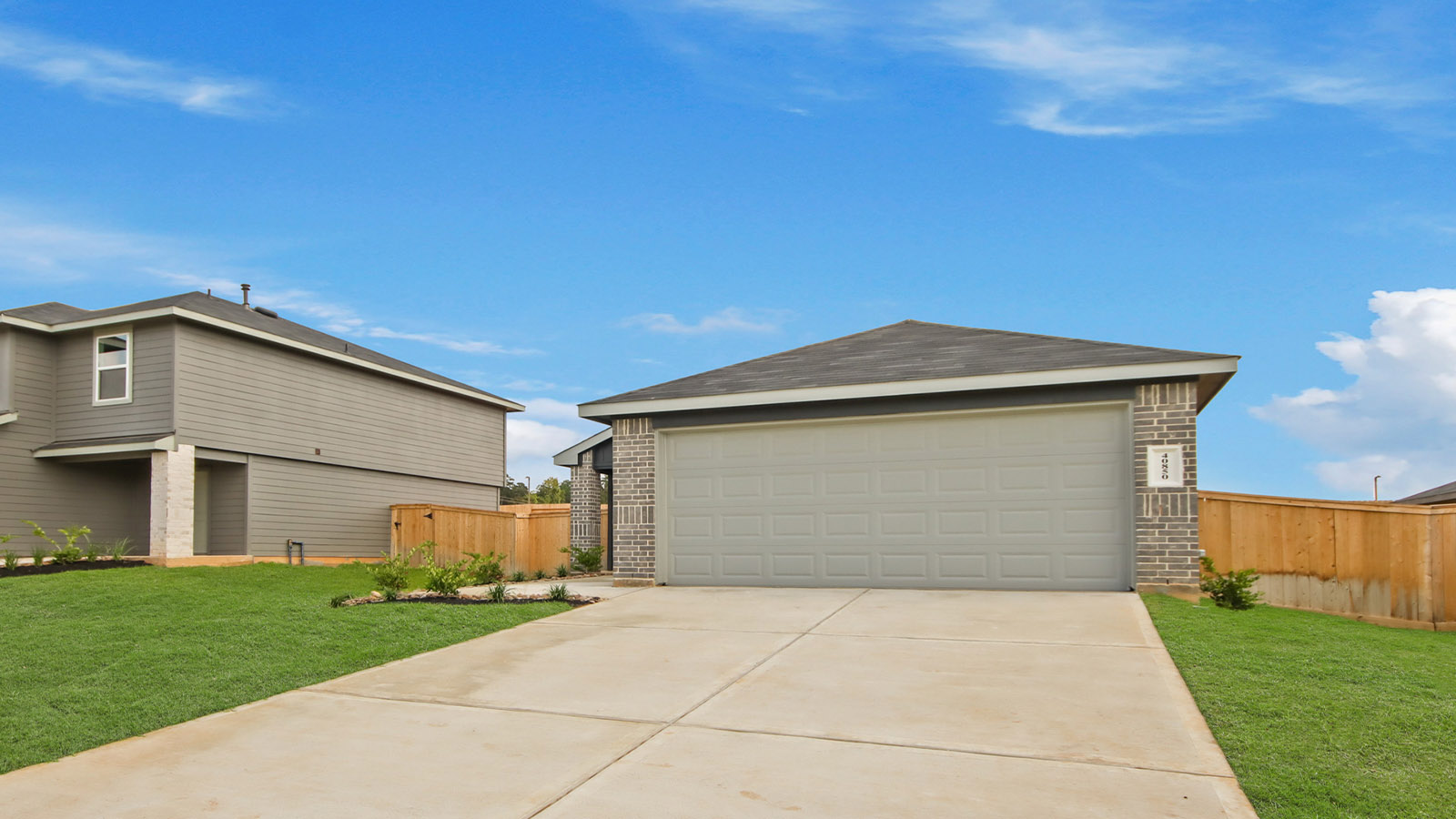 onstory home with siding and stone