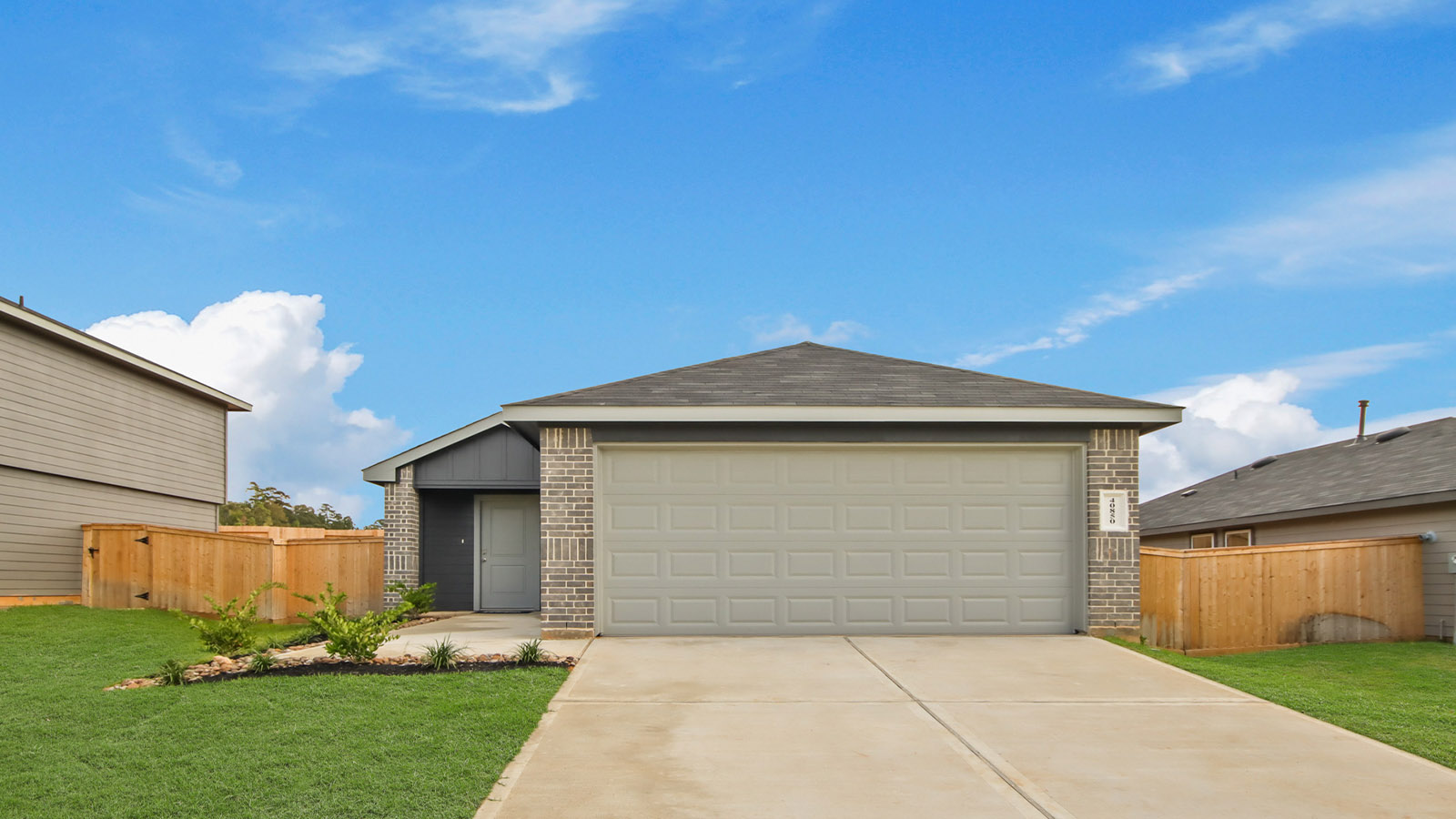 onstory home with siding and stone