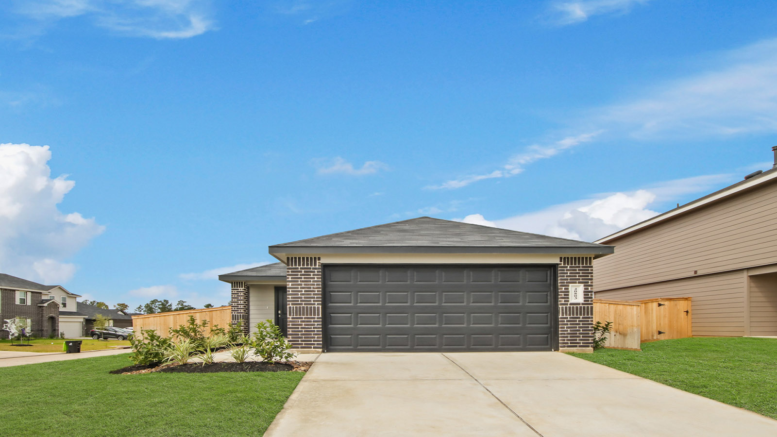onstory home with siding and stone