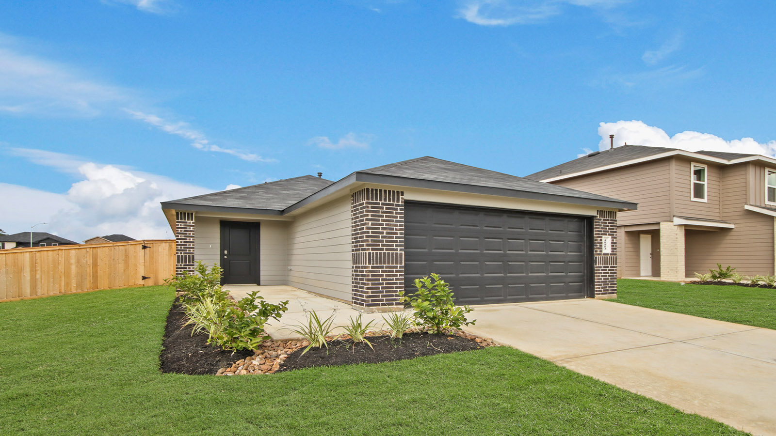 onstory home with siding and stone