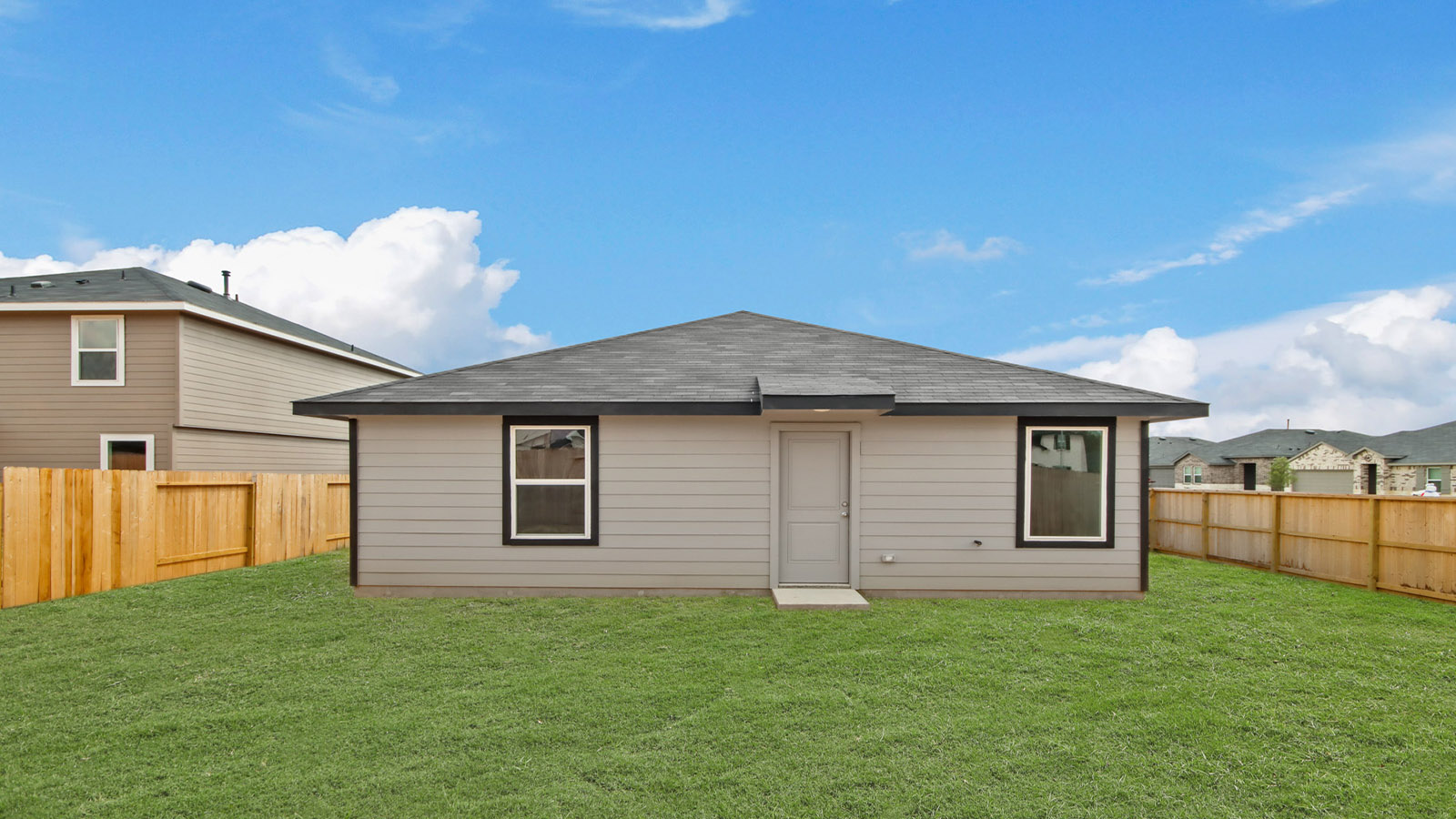 onstory home with siding and stone