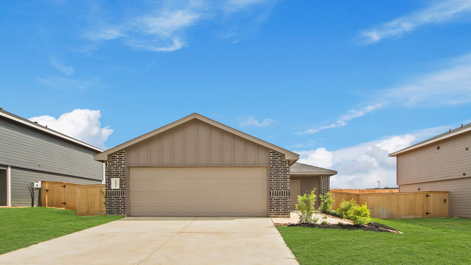 onstory home with siding and stone