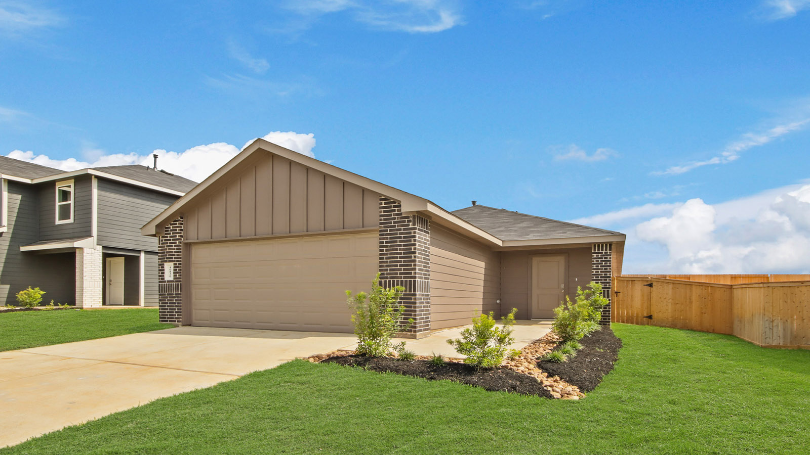 onstory home with siding and stone