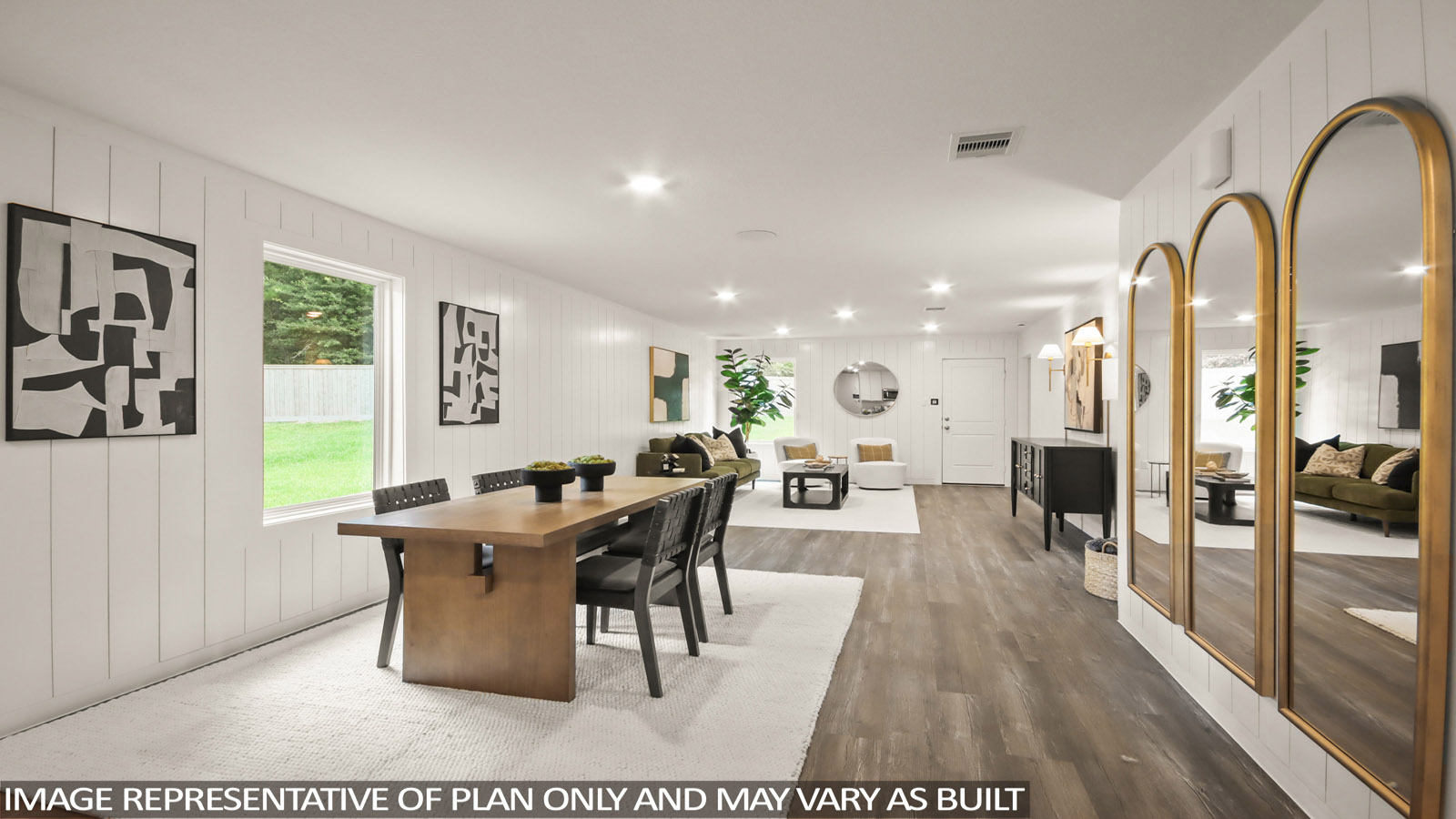 Dining area with vinyl flooring located off from the living room area in Magnolia TX