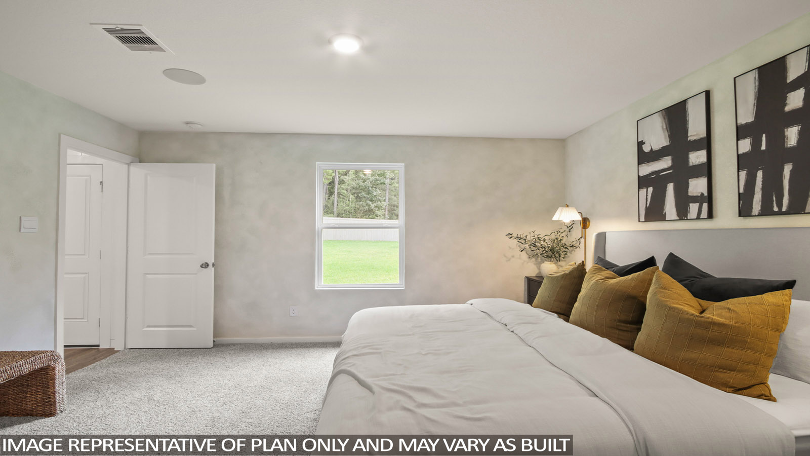 Large Primary bedroom with shag carpet flooring and bright window