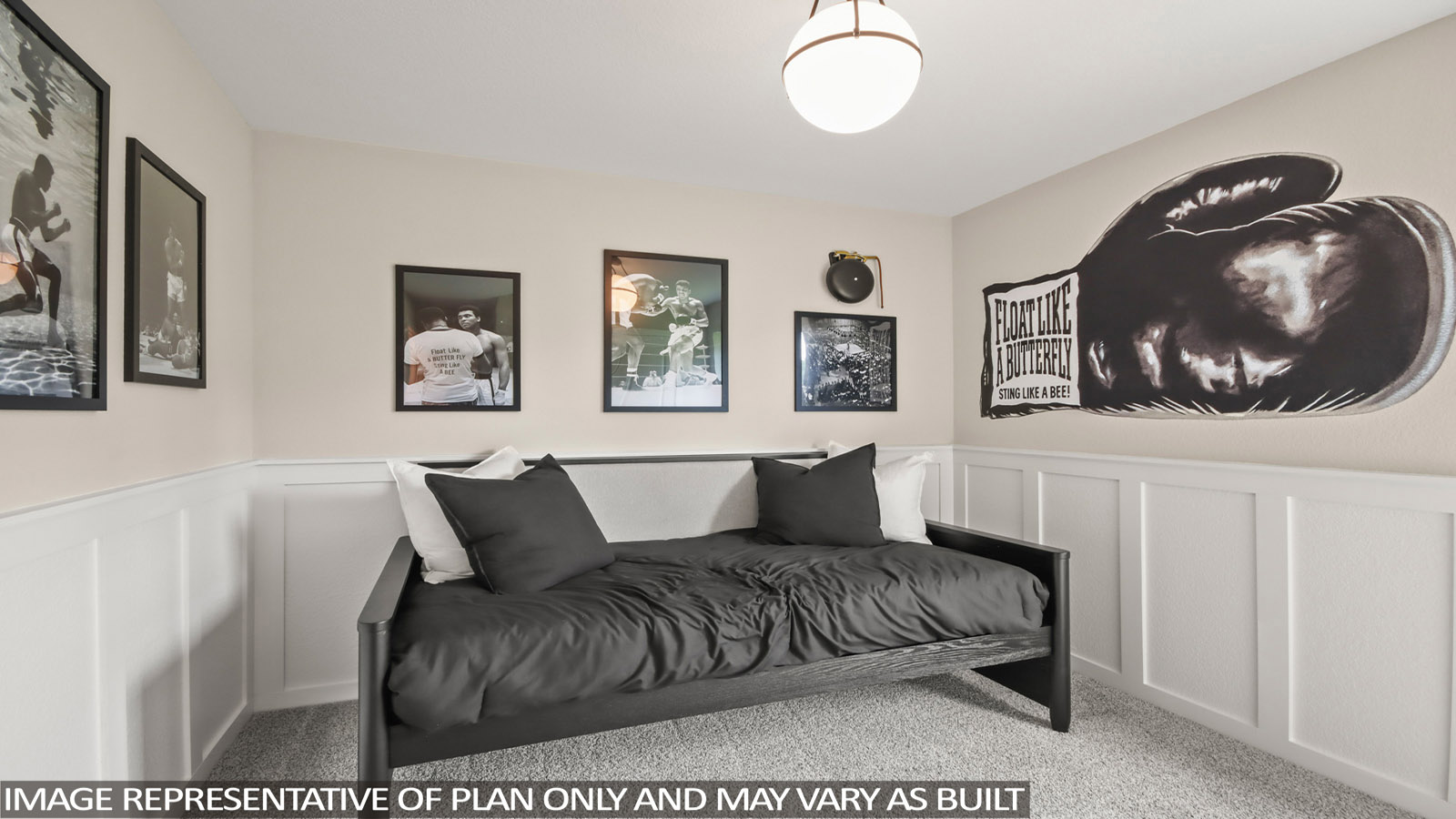 Secondary bedroom with shag carpet flooring and bright window