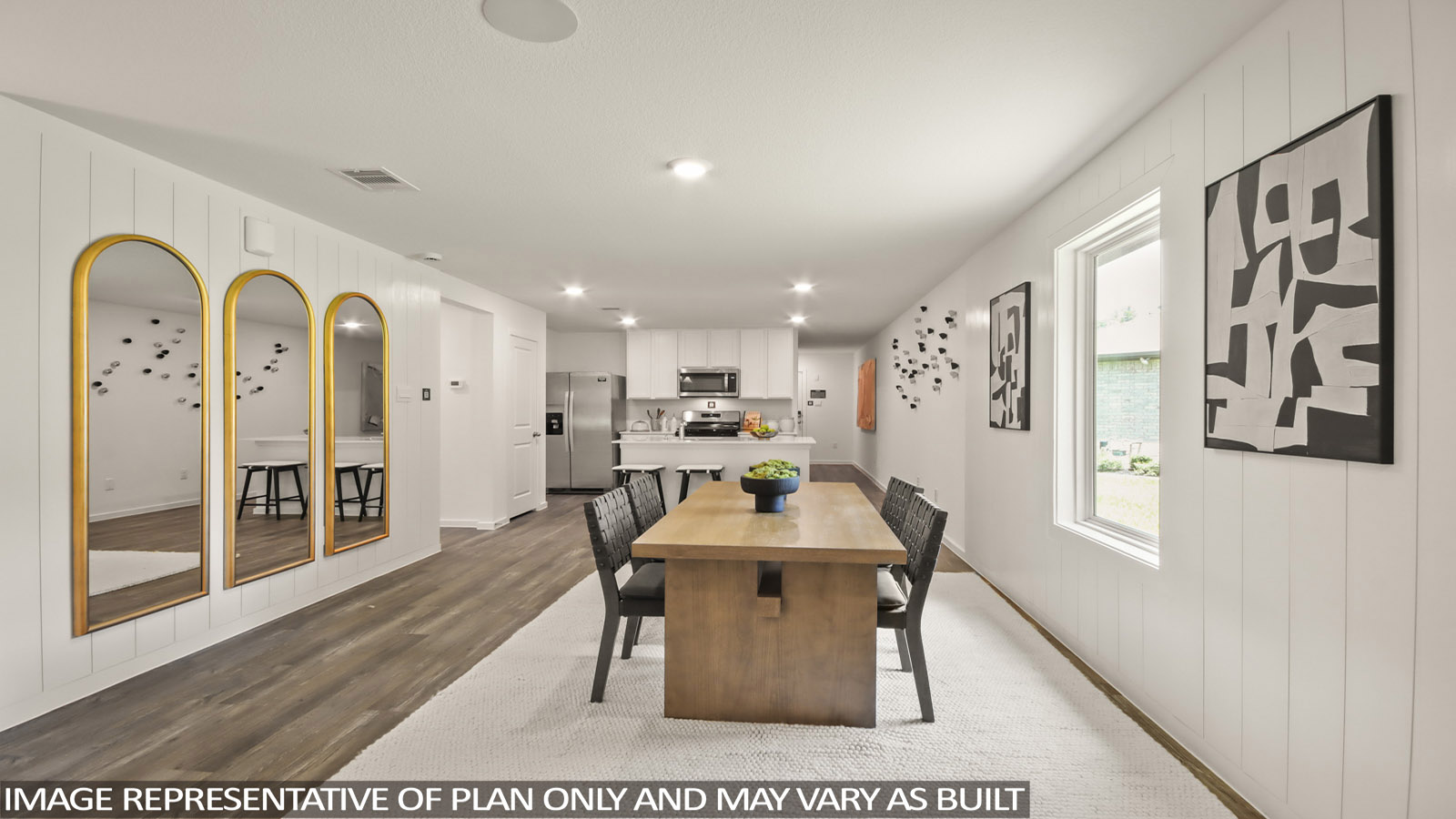 Dining area with vinyl flooring located off from the living room area in Magnolia TX