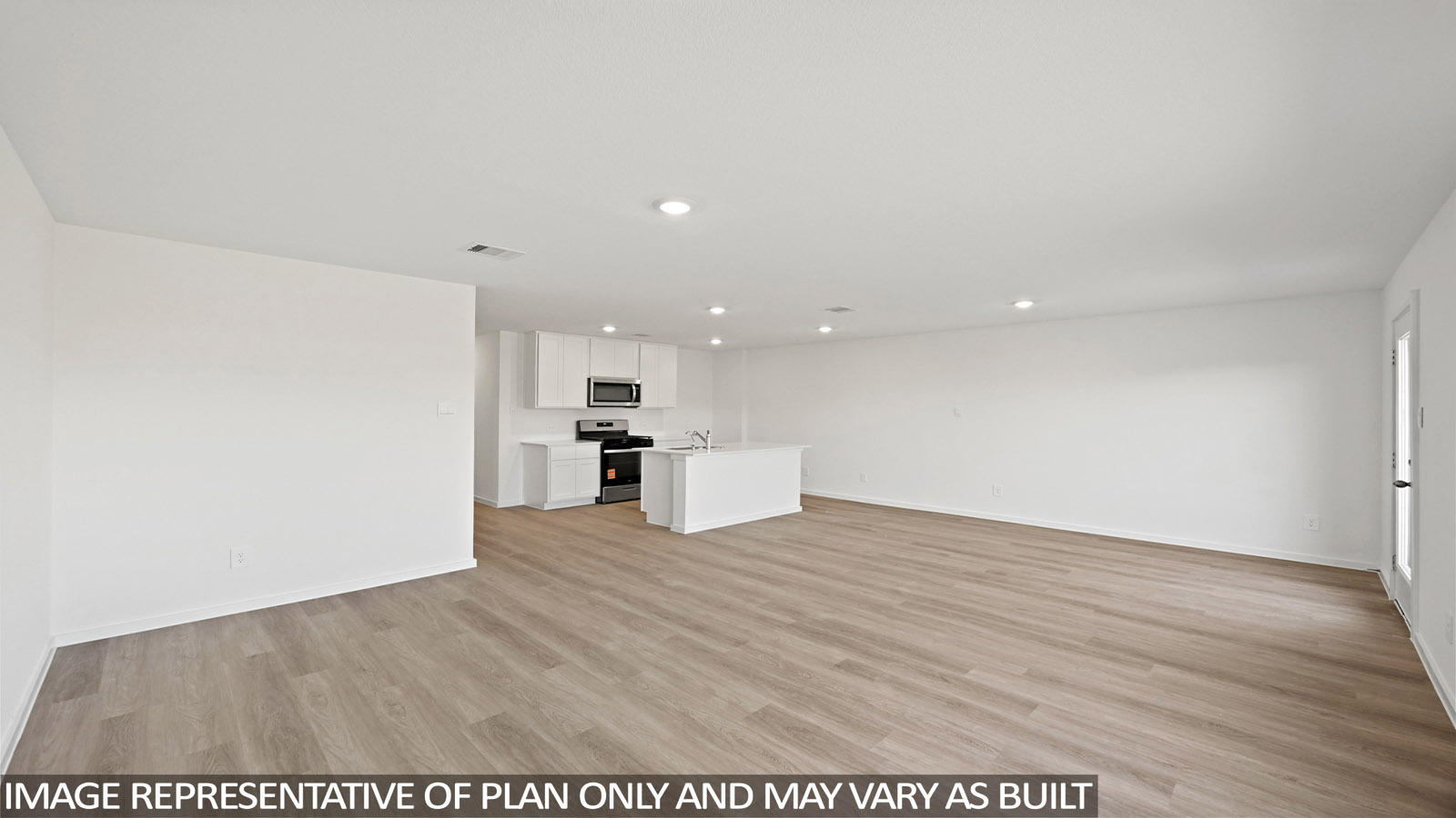 Open concept living, dining, and kitchen area with vinyl flooring and bright windows