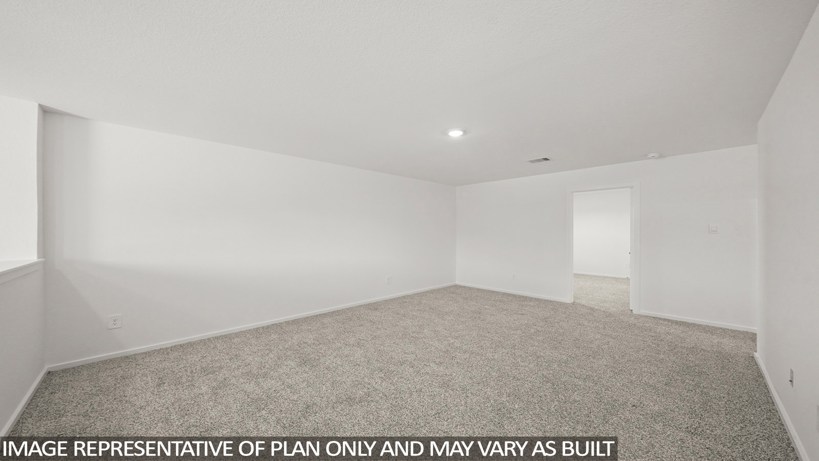 Second story game room with carpet flooring