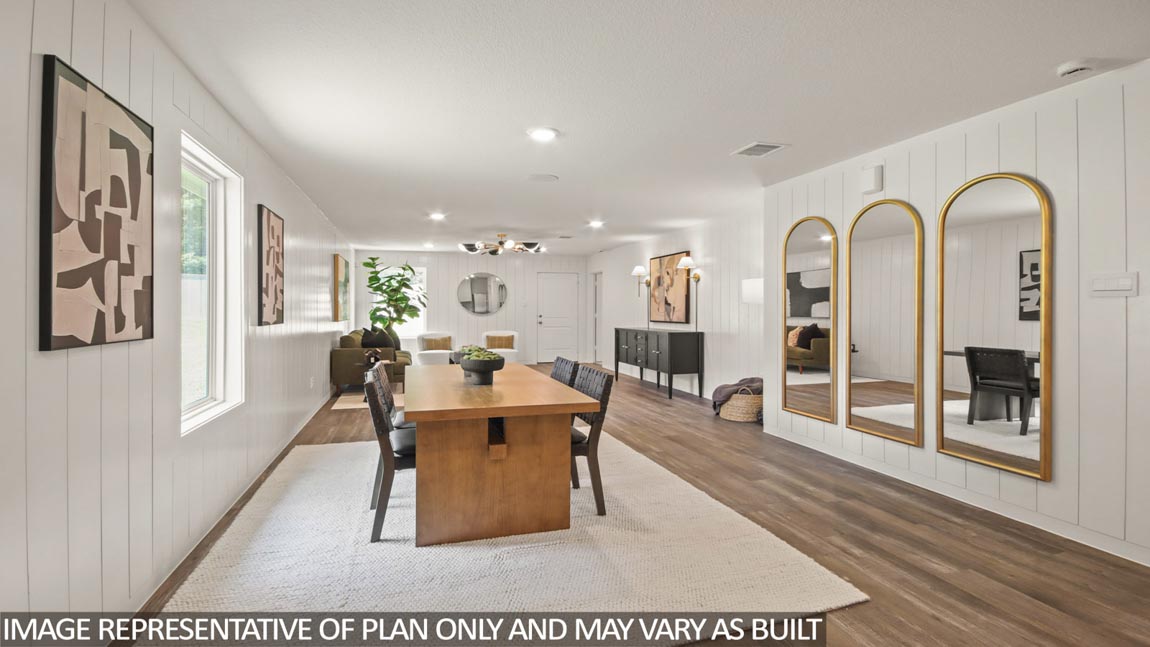 Open concept living and dining space with vinyl flooring and bright windows.