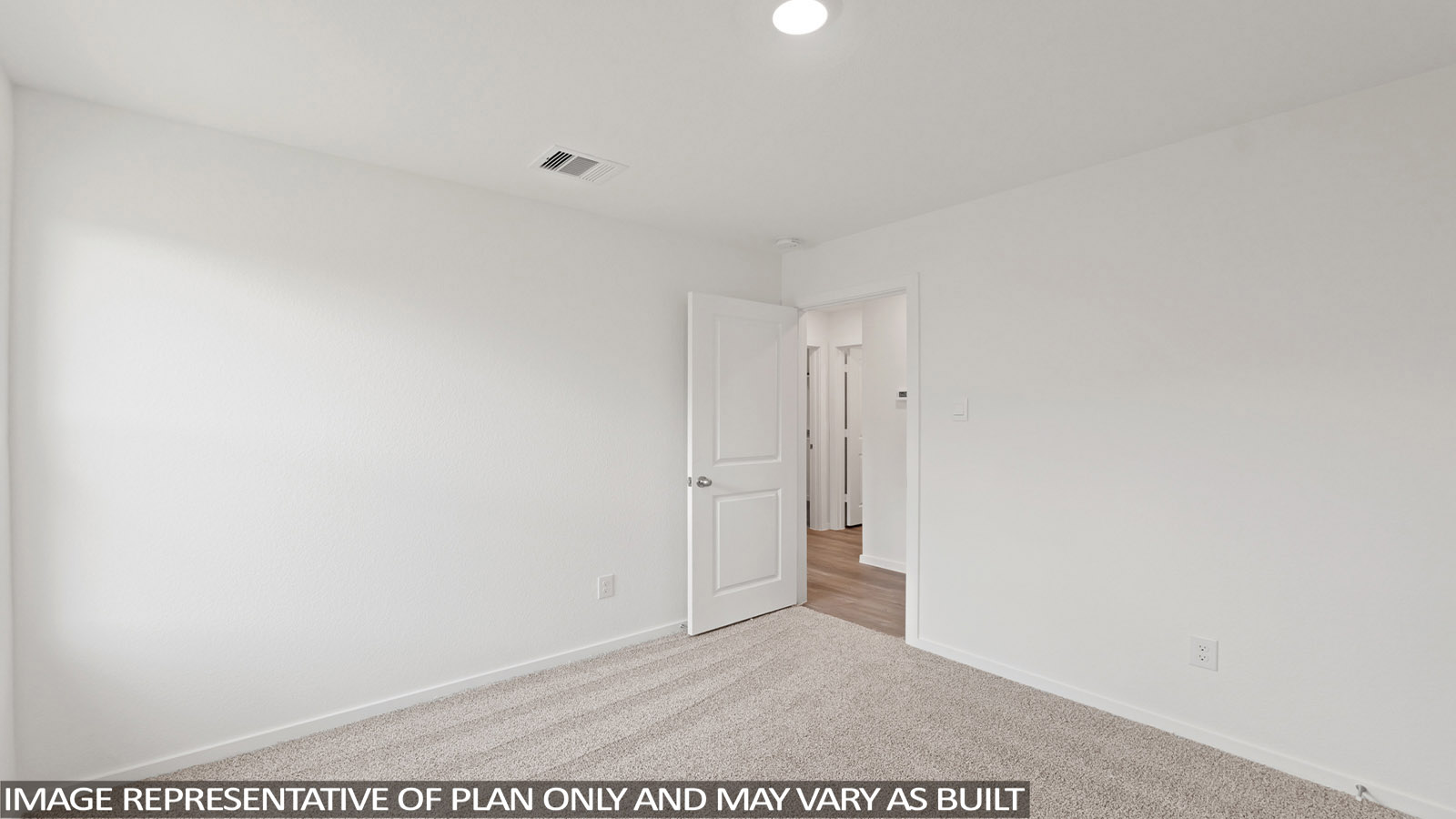 Secodnary bedroom with windows, white walls, and vinyl wood flooring.