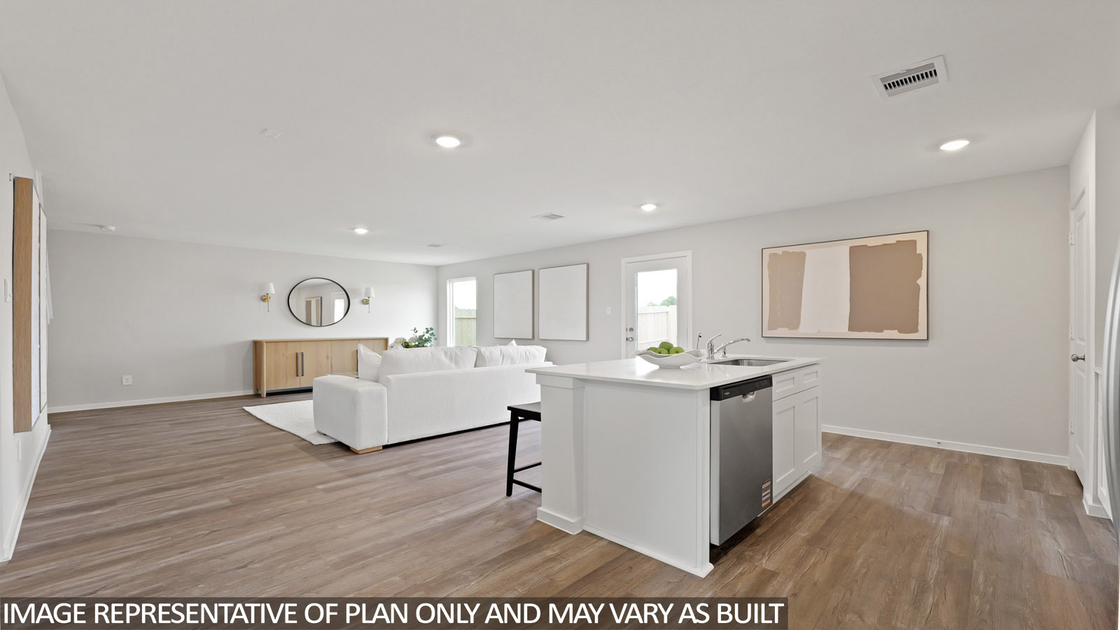 Open kitchen with an island, stainless steel appliances, white cabinets, white walls, and vinyl wood flooring.