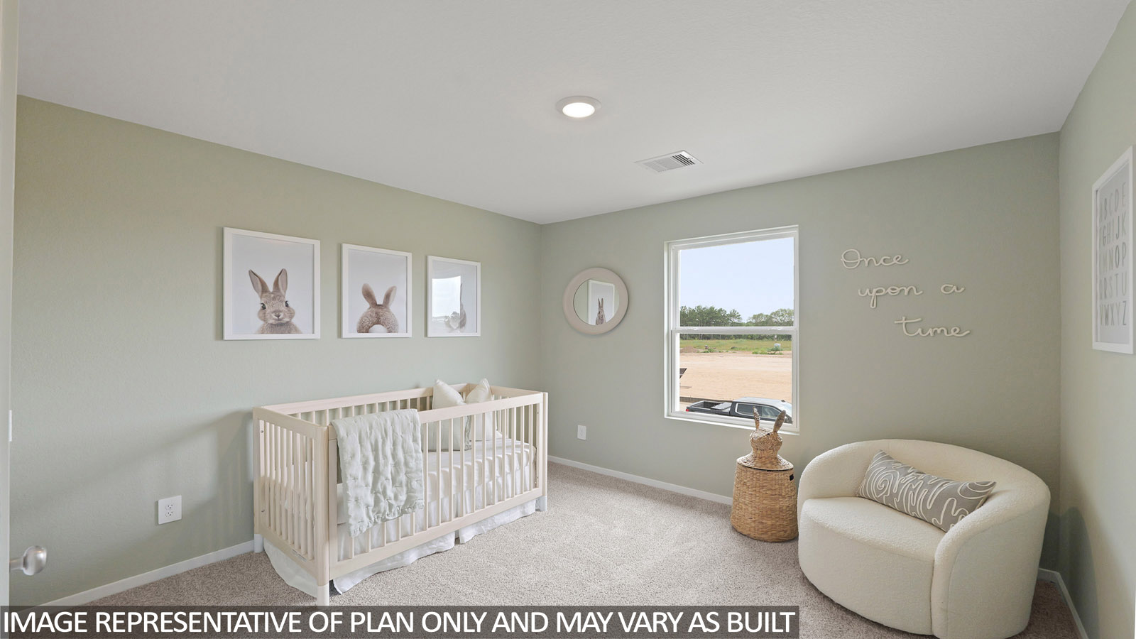 Secondary bedroom with windows, white walls, and light carpet.
