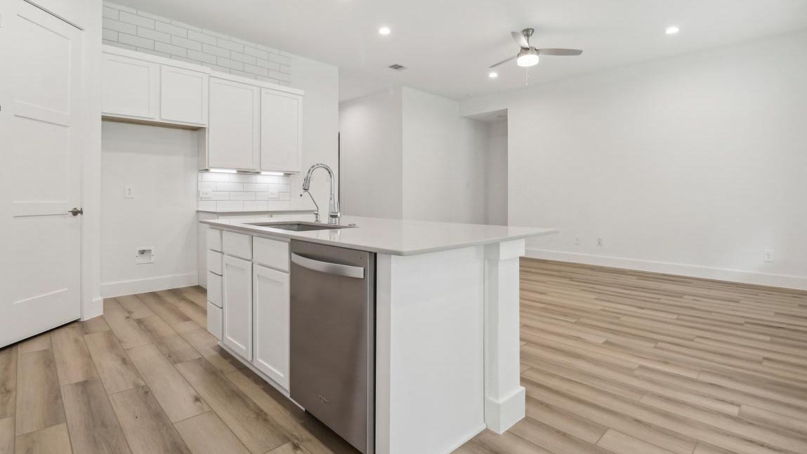 kitchen with stainless steel appliances and quartz countertops