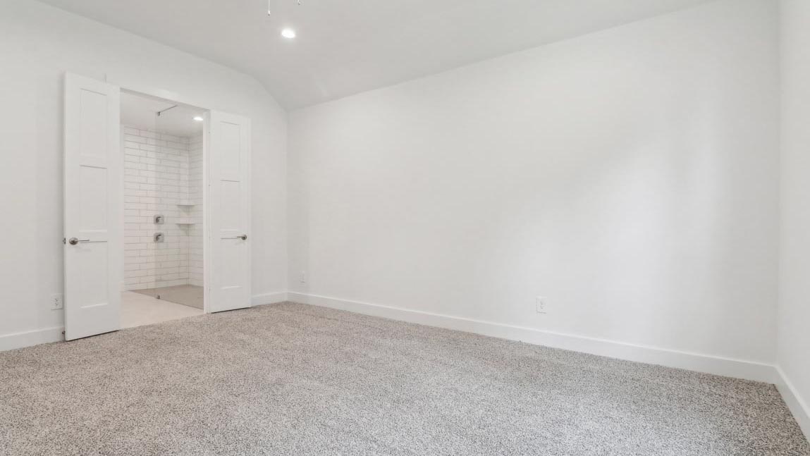 bedroom with carpet flooring and windows