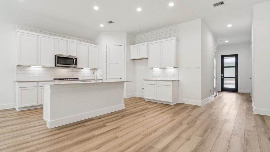 kitchen with stainless steel appliances and quartz countertops