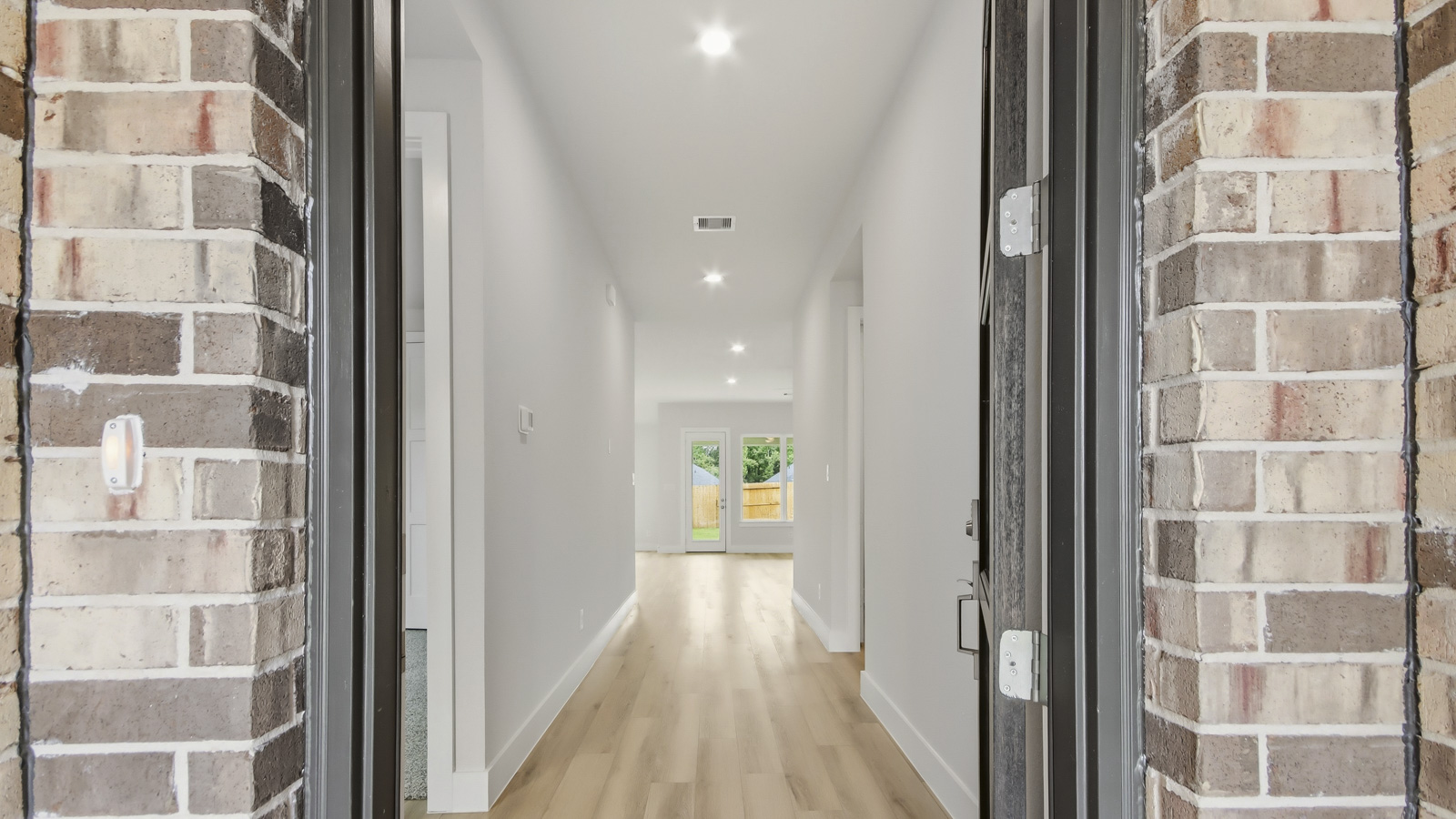 Entry hallway with vinyl flooring sherman williams painted walls