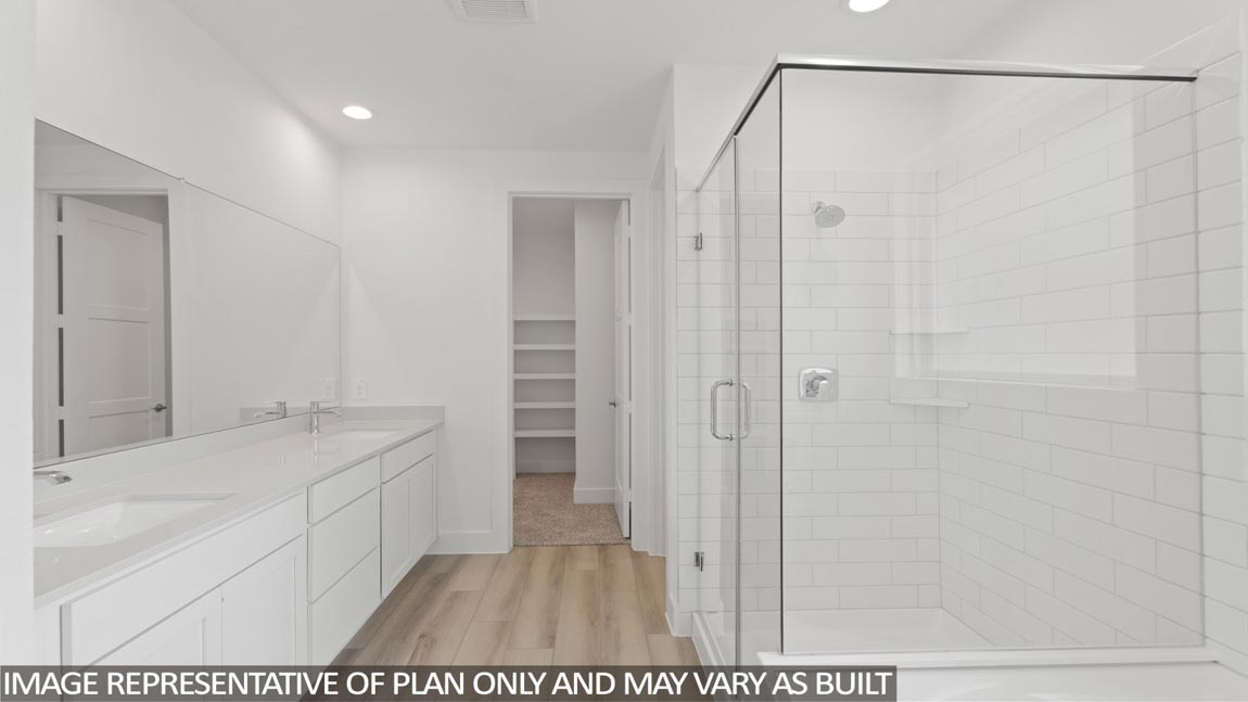 Primary bathroom with tub and shower