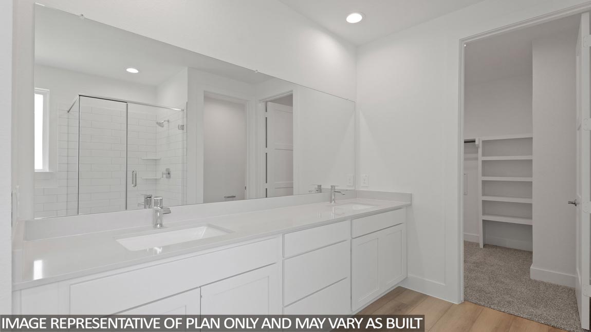 Primary bathroom with tub and shower