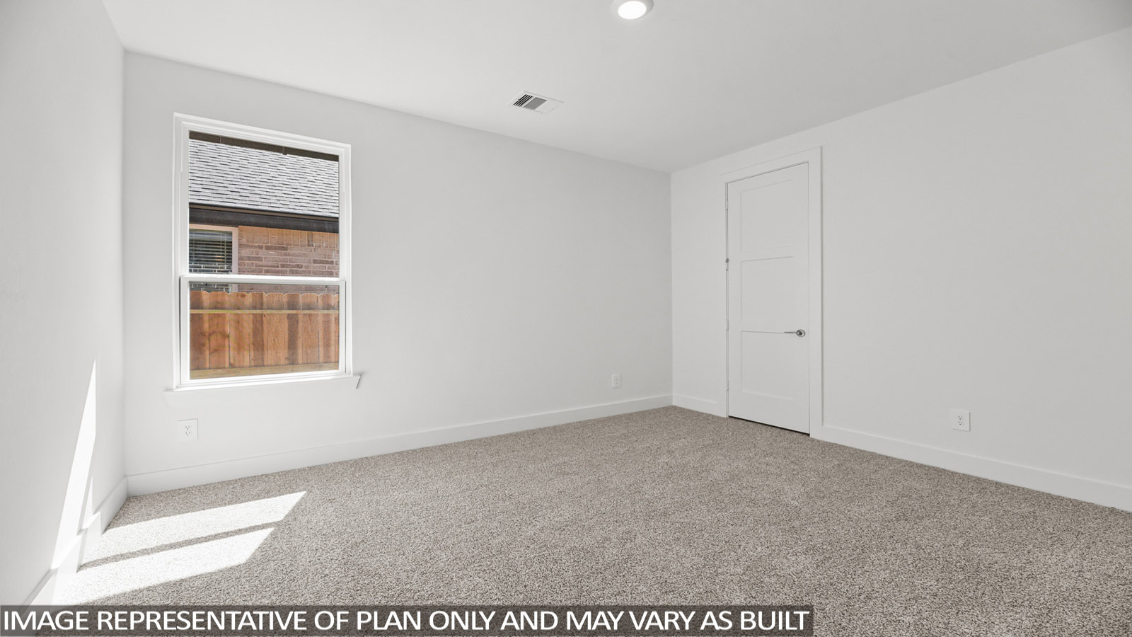 bedroom with carpet flooring and windows