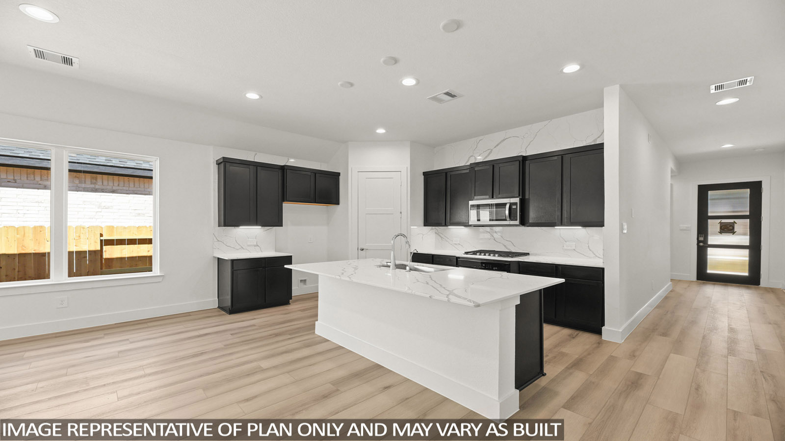 kitchen with stainless steel appliances and quartz countertops
