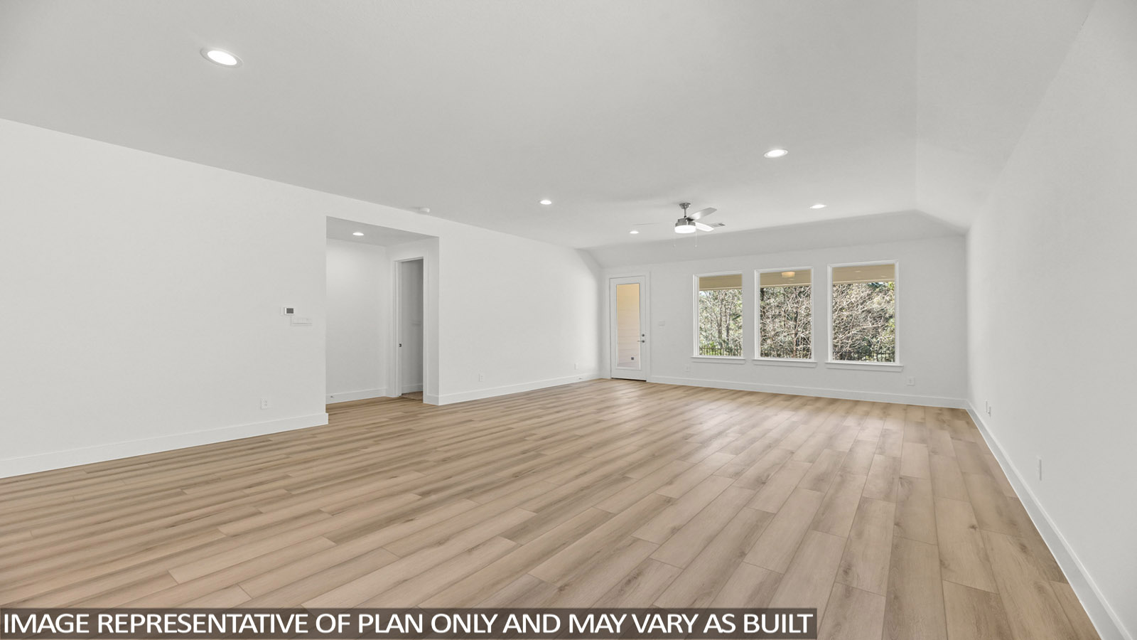 open concept living and dining area with vinyl flooring and large windows