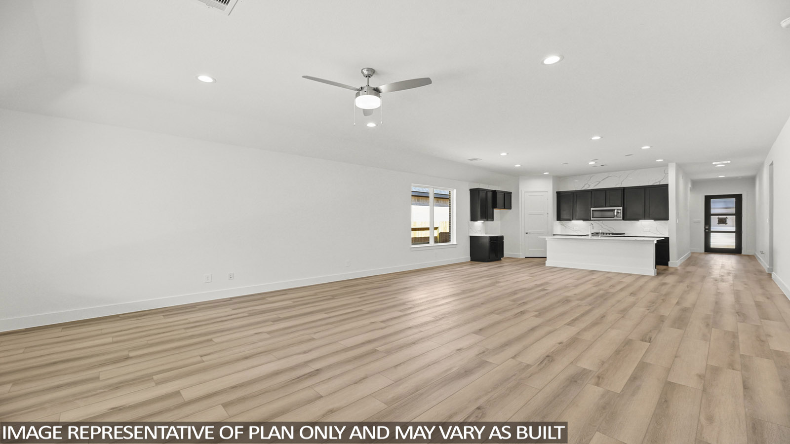 open concept living and dining area with vinyl flooring and large windows