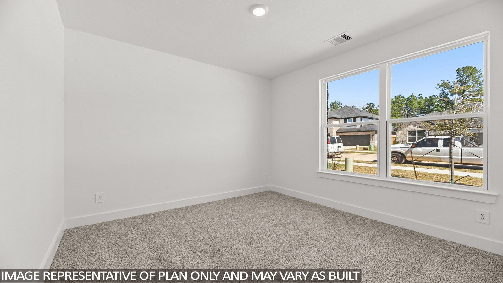 bedroom with carpet flooring and windows