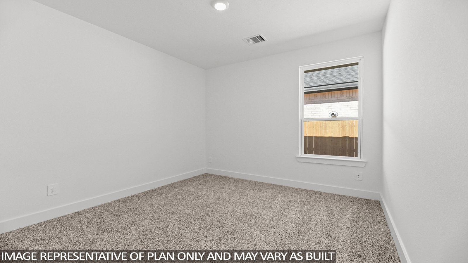 bedroom with carpet flooring and windows