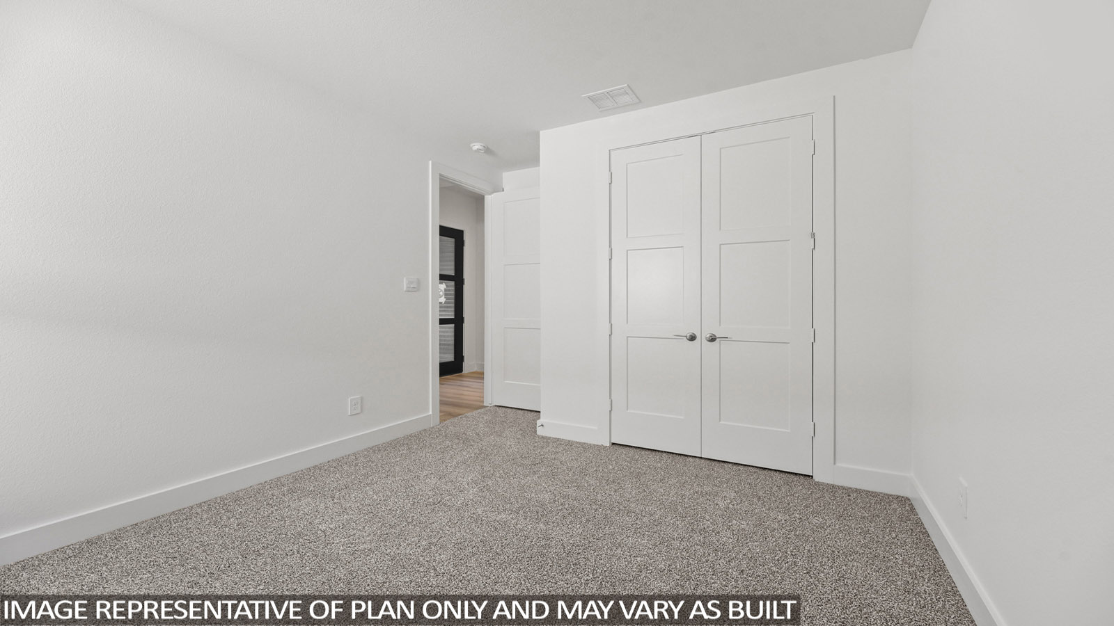 bedroom with carpet flooring and windows