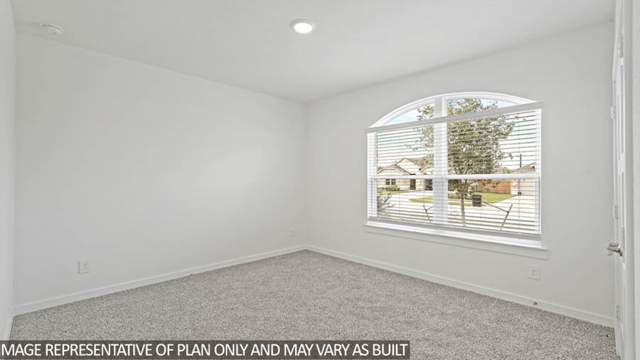Secondary bedroom with bright window