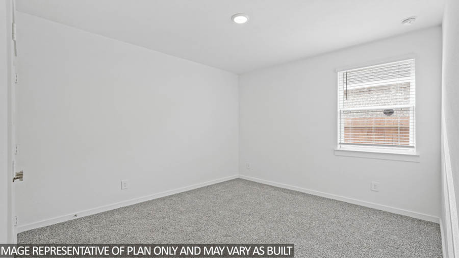 Secondary bedroom with bright window