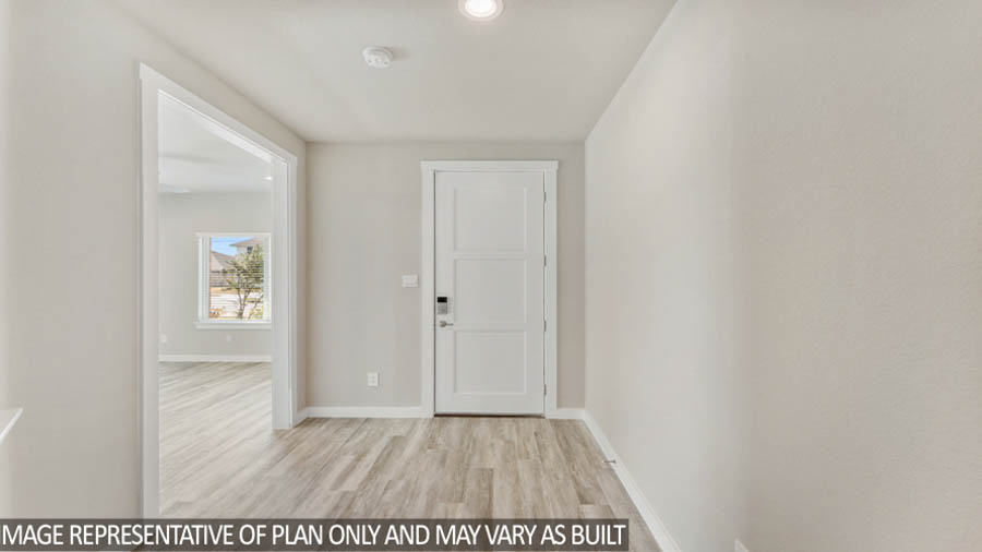 Entry hallway with vinyl flooring